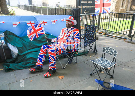 London UK. 31 October 2019.Pro-Brexit campaigner Joseph Afrane outside Parliament, on the day a Brexit deadline of 31 October when Britain was supposed to leave the European Union passes. amer ghazzal /Alamy live News Stock Photo