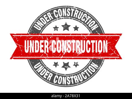 under construction round stamp with red ribbon. under construction Stock Vector