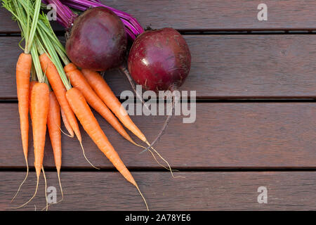 Carrot and beetroot on the wood Stock Photo