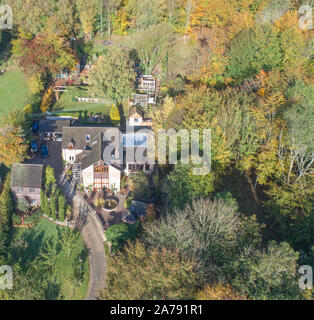 aerial view of the slad valley and a house in the woods near stroud gloucestershire in autumn Stock Photo