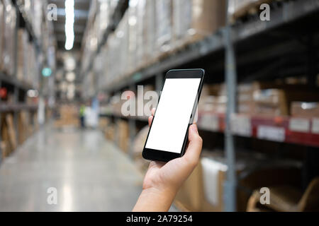 Mockup image of Woman hand holding mobile smartphones isolated white screen for mockup design and others app display background. Graphic design montag Stock Photo