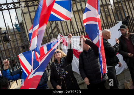 On the day that the UK was scheduled to leave the European Union and political parties commence campaigning for the General Election on December 12th, Brexiters voice their anger outside the British parliament in Westminster, on 31st October 2019, in London, England. Stock Photo