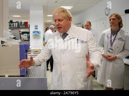 Prime Minister Boris Johnson during a visit to the National Institute for Health Research at the Cambridge Clinical Research Facility, in Addenbrooke's Hospital in Cambridge. Stock Photo