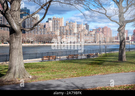 New York City Manhattan buildings from Queensbridge Park on a beutiful winter day. Stock Photo