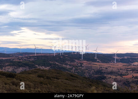 Windmill for electric power production. Landscape with Turbine Green Energy Electricity . Stock Photo