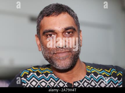 Amnesty International secretary-general Kumi Naidoo at George Best city airport in Belfast, who has said the official response to the ???ticking clock??? of climate change has been far too timid. Stock Photo