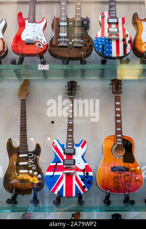 FLORENCE, TUSCANY/ITALY - OCTOBER 19 : Miniature guitars in a shop window in Florence on October 19, 2019 Stock Photo
