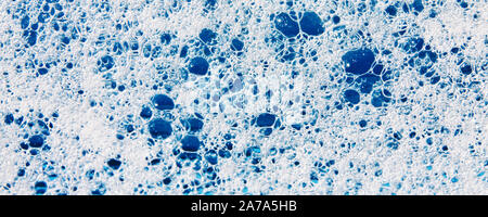 Foam bubbles with blue background Stock Photo