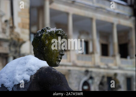 Statues outside Peleș Castle in Sinaia, Romania on a snowy day. Stock Photo