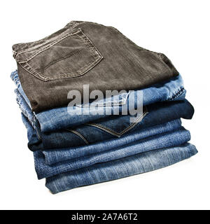 Stack of jeans isolated on white background Stock Photo