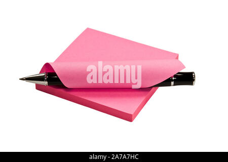 Memo Block with ballpoint pen on white background Stock Photo