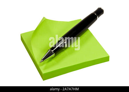 Memo Block with ballpoint pen on white background Stock Photo