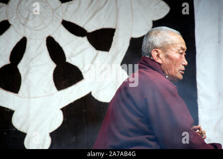 a monk at Lhagang Monastery in Sichuan china Stock Photo