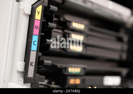 Toners in the laser printer. Multifunction printer, scanner, copier device. Stock Photo