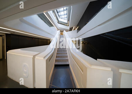 Interior of modern architecture of PolyU School of Design Jockey Club Innovation Tower at Hong Kong Polytechnic University, Hong Kong. Architect Zaha Stock Photo