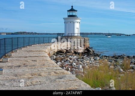 Small, white, steel lighthouse whose seams are disguised as corinthian columns, viewed from Bug Light Park in Cape Elizabeth, Maine -03 Stock Photo