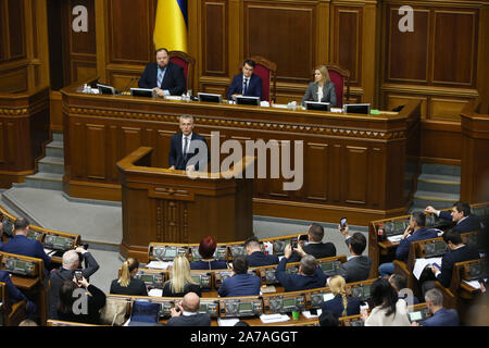 Kiev, Ukraine. 31st Oct, 2019. The North Atlantic Treaty Organization (NATO) Secretary General Jens Stoltenberg (C) addresses lawmakers during a session of the Ukrainian Parliament in Kiev, Ukraine, on Oct. 31, 2019. NATO Secretary General Jens Stoltenberg on Thursday said the doors of the alliance are open for those who wish to join, including Ukraine. Credit: Sergey Starostenko/Xinhua/Alamy Live News Stock Photo