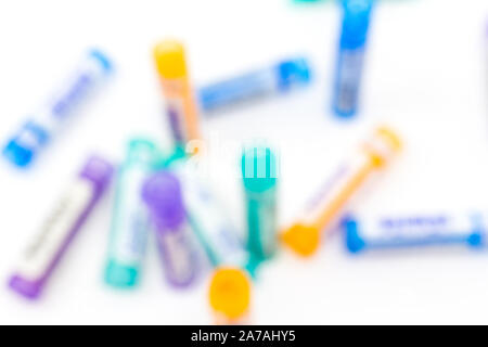Boiron homeopathic medicine plastic tubes blurred background Stock Photo