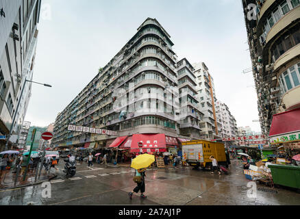 View of street and apartment buildings in old district of Shamshuipo in Kowloon, Hong Kong Stock Photo