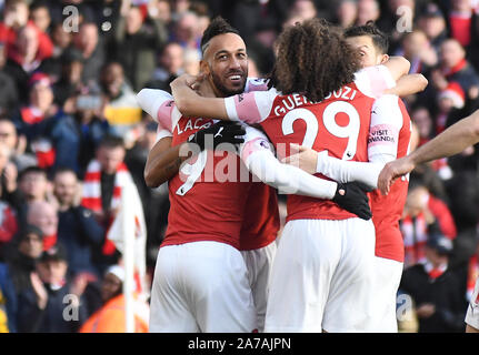 LONDON, ENGLAND - DECEMBER 22, 2018: Pierre-Emerick Aubameyang of Arsenal celebrates after with his teammates he scored his second goal during the 2018/19 Premier League game between Arsenal FC and Burnley FC at Emirates Stadium. Stock Photo