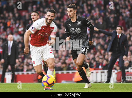 LONDON, ENGLAND - DECEMBER 22, 2018: Sead Kolasinac of Arsenal (L) and Matthew Lowton of Burnley (R) pictured during the 2018/19 Premier League game between Arsenal FC and Burnley FC at Emirates Stadium. Stock Photo