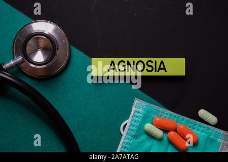Agnosia text on sticky notes. Office desk background. Medical or Healthcare concept Stock Photo