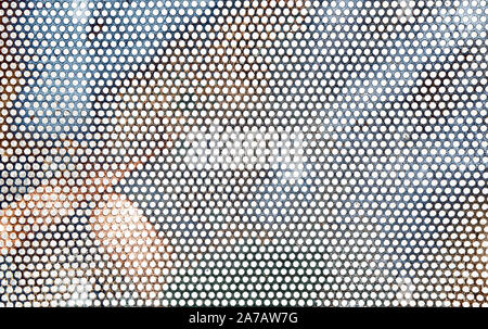 Perforated metal sheet as background. Stock Photo