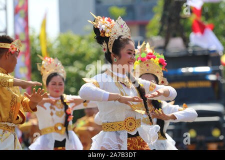 A number of dancers are performing traditional Indonesian dances at cultural activities Stock Photo