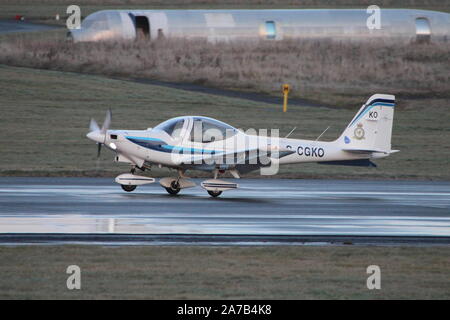 G-CKGO, a Grob Tutor T1 operated by the Royal Air Force in the elementary training role, at Prestwick International Airport in Ayrshire. Stock Photo