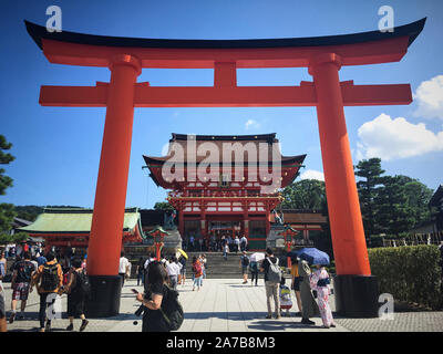 The torii gates of Fushimi Inari Taisha, Japan.  Fushimi Inari-taisha (伏見稲荷大社) is the head shrine of the kami Inari, located in Fushimi-ku, Kyoto. Stock Photo