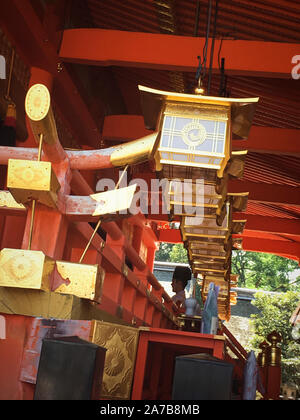 The torii gates of Fushimi Inari Taisha, Japan.  Fushimi Inari-taisha (伏見稲荷大社) is the head shrine of the kami Inari, located in Fushimi-ku, Kyoto. Stock Photo