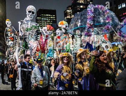 New York, USA,  31 October 2019.  Revelers wear costumes as they participate in the 46th NYC’s Village Halloween Parade in New York City.   Credit: Enrique Shore/Alamy Live News Stock Photo