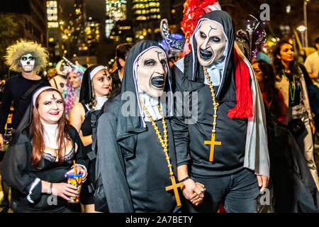 New York, USA,  31 October 2019.  Revelers wear costumes as they participate in the 46th NYC’s Village Halloween Parade in New York City.   Credit: Enrique Shore/Alamy Live News Stock Photo