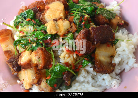 Crispy Pork with Thai Basil (Kra Pao Moo Grob) Stock Photo