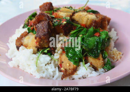 Crispy Pork with Thai Basil (Kra Pao Moo Grob) Stock Photo