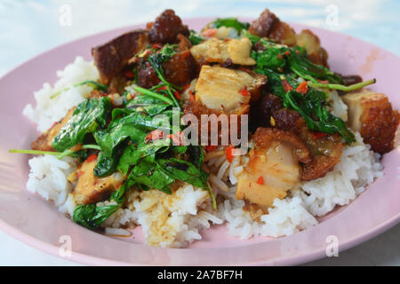 Crispy Pork with Thai Basil (Kra Pao Moo Grob) Stock Photo