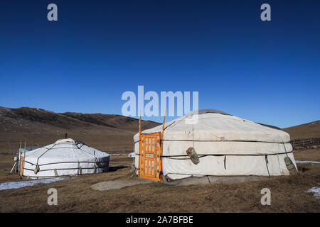 Traditional Mongolian Yurta in Orkhon region mountains landscape Stock Photo