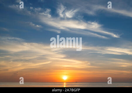 Beautiful sunrise at tropical beach Stock Photo