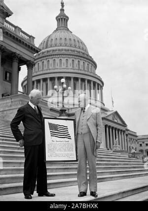 Men holding sign 'The American's Creed' in front of U.S. Capitol, Washington, D.C. ca. 1936 Stock Photo