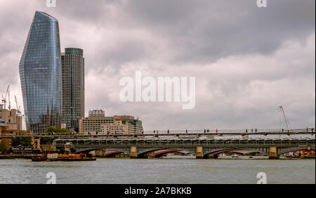 The Millennium Bridge, the Blackfriars Railway & the Blackfriars Bridge and the hardly seen Waterloo Birdge with the Bankside skyline. London, UK. Stock Photo