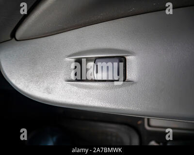 Power window button of a car. Place for text. Transport. Stock Photo