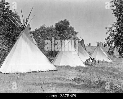 Edward S. Curtis Native American Indians -  Assiniboine Indian Camp ca. 1908 Stock Photo