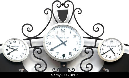 Three clocks next to each other marking the time in different cities around the world Stock Photo