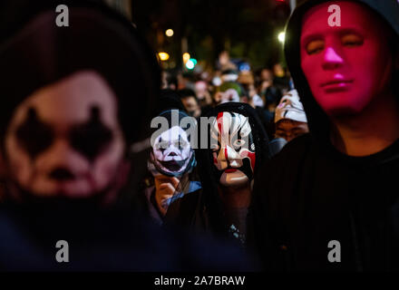 Hong Kong, China. 31st Oct, 2019. Protesters wearing masks during the rally in Causeway Bay, Hong Kong. Protesters at Halloween march in Hong Kong island despite police banned rallies and confront them during the night. Credit: SOPA Images Limited/Alamy Live News Stock Photo