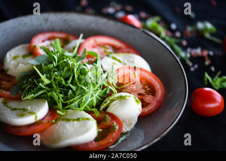 dliciouse italian dish - tasty caprese salad with fresh ingredients Stock Photo