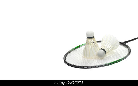 Badminton racquet and two feather shuttlecocks isolated on white background at the right and free place for text at the left Stock Photo