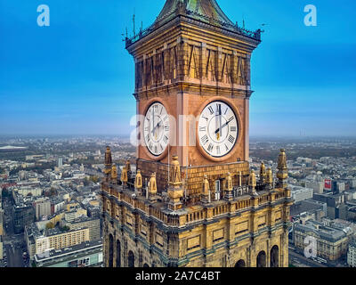 WARSAW, POLAND - OCTOBER 19, 2019: Beautiful panoramic aerial close-up drone view to the Millennium clock (clock face diameter = 6.5 m) on the tower o Stock Photo