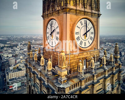 WARSAW, POLAND - OCTOBER 19, 2019: Beautiful panoramic aerial close-up drone view to the Millennium clock (clock face diameter = 6.5 m) on the tower o Stock Photo