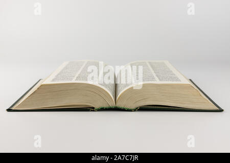 Open vintage book isolated on white background Stock Photo