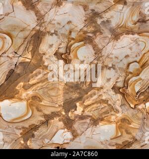 Brown granite tile texture. Seamless square background, tile ready. Stock Photo